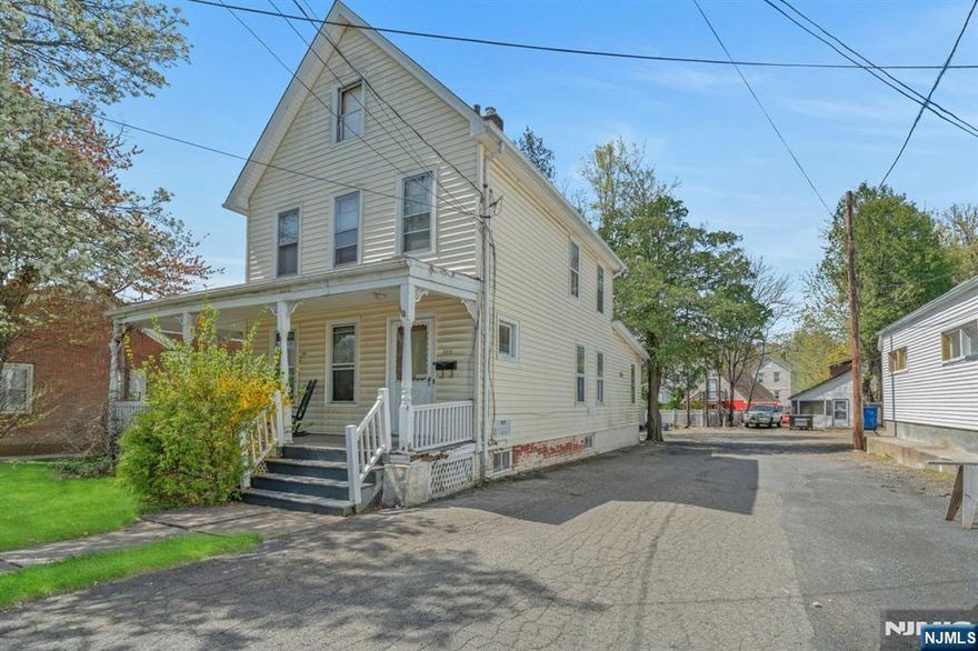 Fantastic opportunity in the heart of Midland Park! This property consists of a two-family home, a detached 3-car garage, and a separate barn perfect for an office or studio, all set on a .3-acre lot. Great potential to renovate, restore, or build new. The two-family home offers two separate apartments, providing rental income potential. Ample off-street parking. House, garage, and barn are all being sold strictly in "as is" condition. Prime central location close to schools, shopping, and transportation. A wonderful opportunity for investors, builders, or buyers with vision!