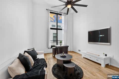 Photo of 518 Gregory Avenue #A-425, Weehawken, NJ 07086 (MLS # 26029007)