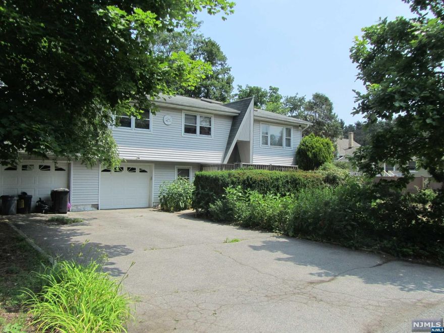 Newfoundland oversized Bi-Level on level lot close to Rt 23. 3 bedrooms on upper level with primary having extra room for office/ exercising or possible nursery. Lower-level family room with wood burning fireplace & pellet stove. Sliders to private fenced in back yard backed by watershed property. Extra fenced in area for dog or garden. Den or possible 4th bedroom on lower level & two car garage. Central air on upper level only. 1 year old hot water heater. New 3 bedroom septic just completed. House is strictly being sold "AS IS" & microwave does not work.