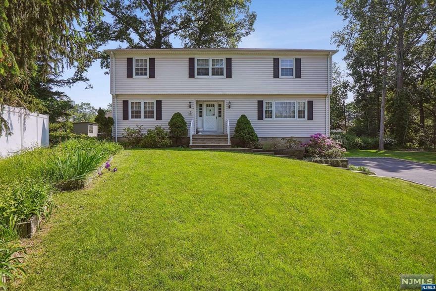 Embrace the opportunity to make this well built, 4 bedroom 2.5 bath colonial your forever home. Nestled on a serene cul-de-sac, this home offers a large entryway foyer with 2 closets, generous size rooms and hardwood floors throughout. Located on the second floor are 2 full baths and 4 spacious bedrooms. One of the most enticing features of this property is its location. It is situated within walking distance to the newly built center of town (currently in progress). Highly desirable Hanover Township is known for its low taxes and excellent schools. Explore local shops, boutiques, and restaurants, or take a leisurely stroll through the nearby picturesque parks and green spaces.