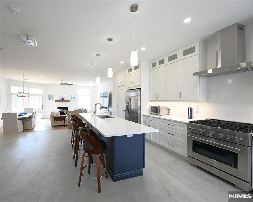 WELCOME TO THIS SPECTACULAR, FULLY RENOVATED, LAKEFRONT TOWNHOME, OFFERING , 4 BEDROOMS, 3.5 BATHS, AND LOFT. INCLUDES SWIMMING POOL, BOAT SLIP, BOAT STORAGE, ELECTRIC CAR CHARGER. FULLY OPEN FLOOR PLAN, GREAT FOR ENTERTAINING. PATIO,FROM BASEMENT,MAIN FLOOR DECK, THIRD FLOOR DECK, ALL OVERLOOKING LAKE. A GREAT OPPORTUNITY TO HAVE A NEWLY REMODELED TOWNHOME ON THE WATER WITH CLOSE PROXIMITY TO NEW YORK CITY. AMAZING EXTENDED FAMILY OPTION!