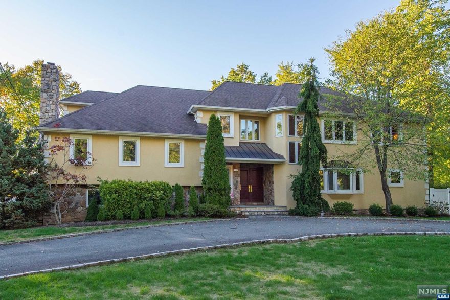 PRESTIGE of COVENTRY and GRANDNESS of EUROPEAN style 5 Bedroom + 5 Bath COLONIAL w/over 5000 Sq Ft of Living Space. Beautiful RESORTGROUNDS incl Completely Renovated HEATED POOL . Be Wowed by TRULY GRAND FOYER! ENOURMOUS 550sq ft ALL CUSTOM Kitchen with SEATING for 20.Enjoy VIEWS of the PATIO & POOL thru French Doors and Sliders from FORMAL Dining, Living and Family Rooms. GREAT ROOM with ARCHITECTURALCEILINGS offer more Backyard Views. Cozy MASTER SUITE features Oversized JETTED TUB, BIDET, walk-in Outfitted Closet and TRAY CEILING + Stunning BARNEY like Walk in FULLY OUTFITTED Closet off Master Suite. Exceptional Features: CATWALK overlooking 2-Story FOYER, 1 GAS + 1 Wood Burning FIREPLACES, Italian PORCELAIN Bathrooms, HARDWOOD floors throughout. GRAND and BACK STAIRCASES. Close proximity to all that Livingston has to offer! MOVE RIGHT IN & ENJOY LIFE!