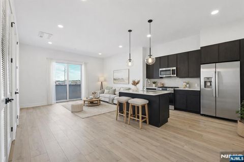 Photo of 487 Market St #203, Saddle Brook, NJ 07663 (MLS # 26010649)