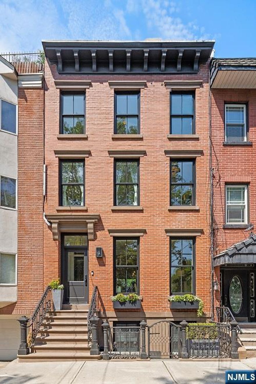 208 5th Street is 20 foot wide townhouse that offers five bedrooms, three and one half bathrooms over four full floors of living, located in one of Hobokenâ€™s most unique and desirable areas directly across from Church Square Park in midtown Hoboken. This large historic townhome has been completely gut renovated and extended and provides a thoughtfully designed layout with both formal and casual entertaining areas. The architect and designer have retained all the wonderful aspects of historic brownstone architecture and incorporated expert craftsmanship with a stunning design that perfectly blends modern and classic styles that will delight even the most sophisticated townhome buyer. No detail has been overlooked in the renovation of this stunning home. Entering the parlor floor through double doors and built-in mudroom you are struck by the open floor plan and the abundance of light that streams through the home from its southern exposure. The center of the home is anchored by a custom chefâ€™s kitchen with cabinets by custom cabinetry, quartz countertops, Wolf stove, Miele wall ovens, Subzero Fridge, Fischer Paykel dishwasher and wine fridge. The dining room features original exposed brick and floor to ceiling windows and the large living area has gorgeous coffered ceiling with a lovely gas fireplace flanked by custom built-in bookcases and storage. The exceptional layout is perfect for entertaining...