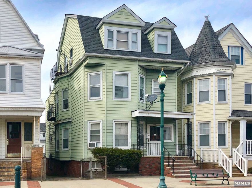 Rare opportunity to own a legal 3-family investment property with finished basement and great layout throughout. First & second floor units each offer living room, oversized kitchen, 3-bedrooms, and full bath. Unit 2 includes an additional room/office. Unit 3 includes living room, bedroom, eat-in kitchen, and full bath. Full, finished, walkout basement with 2 large rooms, plenty of storage, and full bathroom. All separate utilities, current green card (renewed on Feb. 2019), newer roof (2011), and updated electrical panels & meters (2011). Concrete paved walkway approx. 1 car width. Property sold AS-IS. Located 2 blocks from West Hudson Park offering scenic walking paths and recreation, one block from NJ Transit buses, and short walking distance to the grammar school, shopping, and restaurants.