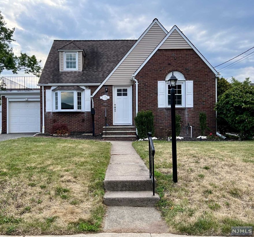 Beautiful well-maintained three bedroom Cape in desirable Fairlawn Borough. Hardwood floors throughout. Charming entrance foyer flows into beautiful living room with bay window. Lovely dining room with nine-lite door leading out to three-season porch. Kitchen with stainless appliances and quartz countertops. Master bedroom with additional generous sized bedroom and full bath all on the main floor. Second floor offers large bedroom and private office or den. Basement has large finished Family room with Powder Room. Separate area for laundry and utilities.