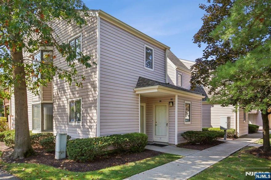 Welcome to Campagna at Montville, a highly sought-after 55+ community offering comfort, style, and convenience. This beautifully updated corner unit is set in a prime location within the community and features a bright, open layout designed for modern living. Step inside to find a bright open floor plan featuring a large foyer with wide staircase & chair lift, leading to the spacious living room, dining area, and a freshly updated all-white kitchen with new granite countertops, new dishwasher, pantry, and a full laundry room. Natural light pours in through generous windows, while sliders off the living room lead to a private deck, perfect for morning coffee or evening relaxation. The sunlit dining area seamlessly flows into the large living space, making it ideal for both everyday living and entertaining. Brand-new flooring runs throughout, adding a fresh and modern touch. Unwind in the generously sized primary bedroom with plenty of closet space and large windows. The updated full bath boasts a new stall shower and stylish vanity. With abundant closets and storage throughout, this home checks all the boxes. Enjoy a low-maintenance lifestyle in this vibrant 55+ community, conveniently located near shopping, parks, dining, and major highways for easy access.