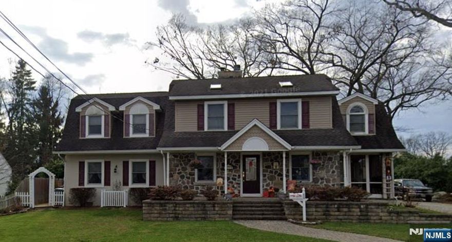 LOVELY, SPACIOUS HOME WITH OVER 2,500 SQ. FT. OF LIVING SPACE LOCATED ON ONE OF THE MOST DESIRABLE STREETS IN MIDLAND PARK!! FEATURING AMAZING CURB APPEAL, THIS HOME IS SITUATED ON A LARGE, FLAT PROPERTY ON A CUL-DE-SAC ON COLONIAL ROAD. ENTER INTO A FORMAL LIVING AREA WITH A DUAL GAS FIREPLACE, HARDWOOD FLOORS THROUGHOUT. THE OPEN FLOOR PLAN LEADS TO A KITCHEN, BUILT IN 2004, WITH GRANITE COUNTERS, AN ISLAND, A DOUBLE OVEN, AND STAINLESS STEEL APPLIANCES. THE KITCHEN FLOWS INTO A STUNNING 20X20 FT GREAT ROOM WITH A COZY FIREPLACE. UPSTAIRS, YOU'LL FIND 3 SPACIOUS BEDROOMS WITH AMPLE CLOSET SPACE, INCLUDING A PRIMARY BEDROOM WITH 3 CLOSETS (ONE WALK-IN). THE ATTIC OFFERS EASY ACCESS FOR ADDITIONAL STORAGE. THE BASEMENT IS SPACIOUS AND CAN BE FINISHED INTO ADDITIONAL LIVING SPACE, AND THE NEWLY BUILT 2024 GARAGE IS A 2-CAR OVERSIZED DESIGN WITH EXTENDED WIDTH AND LENGTH (21 FEET) AND INCLUDES ROOM FOR OVERHEAD STORAGE.