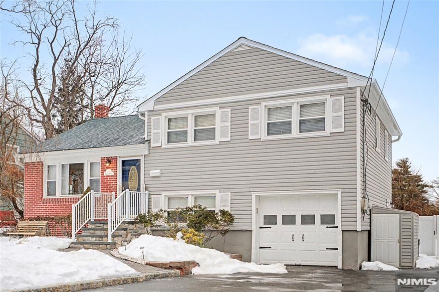 Beautifully maintained 3-bedroom, 1.5-bath split-level home located on a quiet dead-end street in the desirable Redwood section. Features include hardwood flooring, spacious rooms, and a modern kitchen that opens to the dining area with sliders leading to a large deck overlooking the fenced-in backyard perfect for entertaining. The ground level offers a half bath and a flex room ideal for a home office, guest room, or den, plus a finished basement with rec room and laundry area. Major updates include a newer roof, furnace, and upgraded electrical. Ample closets and storage throughout. Fantastic location close to shopping, parks, and major commuters delight with the jitney shuttle to NJ transit just at the corner!!