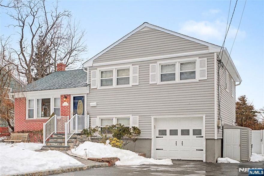 Beautifully maintained 3-bedroom, 1.5-bath split-level home located on a quiet dead-end street in the desirable Redwood section. Features include hardwood flooring, spacious rooms, and a modern kitchen that opens to the dining area with sliders leading to a large deck overlooking the fenced-in backyard perfect for entertaining. The ground level offers a half bath and a flex room ideal for a home office, guest room, or den, plus a finished basement with rec room and laundry area. Major updates include a newer roof, furnace, and upgraded electrical. Ample closets and storage throughout. Fantastic location close to shopping, parks, and major commuters delight with the jitney shuttle to NJ transit just at the corner!!