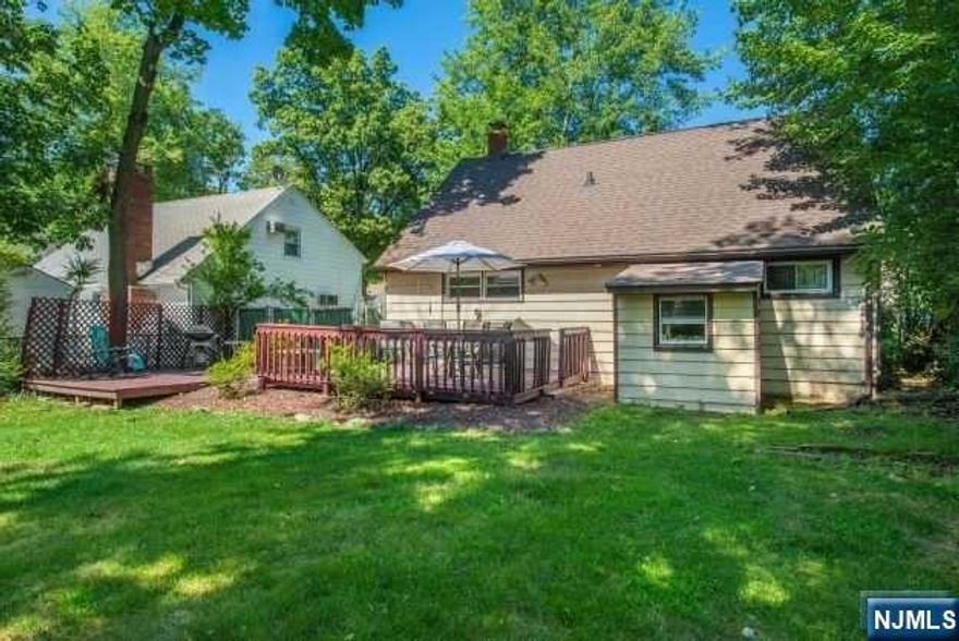 Welcome home to privacy & tranquility, this lovely cape cod home is warm and inviting. The cozy living room with a comfortable couch and chairs, is the perfect spot to relax and enjoy home. The kitchen is functional and stylish; offers a layout designed for function and flexibility. This home also features a dining room with built-in shelves & picture window overlooking the front yard. Also on the first floor, a bonus room currently used as a TV room/den but has been used as a bedroom; could be a possible home office. Two multipurpose bedrooms on the 2nd floor, create a perfect place to rest, each with under-eave storage in addition to closets. The backyard boasts both a small patio area & deck overlooking a deep, lush backyard-ideal for seasonal entertaining. Hunterdon Road is a great location near restaurants and shops-in both in West Orange & Livingston. Easy access to major NJ highways makes commuting a breeze! Local shuttle bus to NYC trans blocks away.