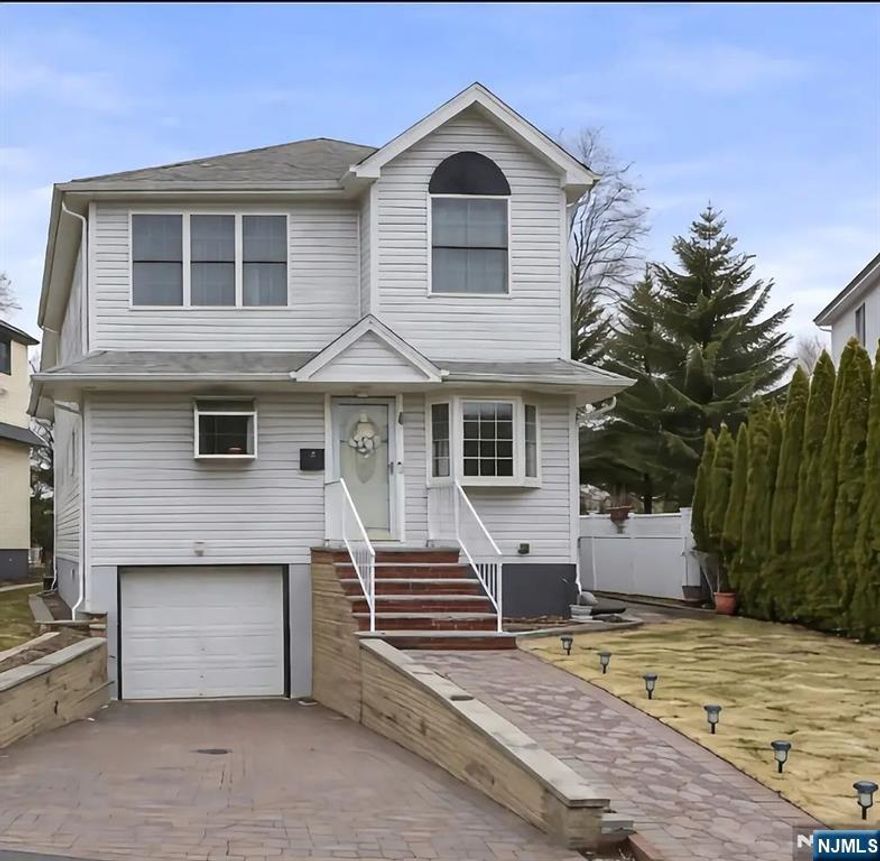 Location, Location, Location! Welcome to this beautifully maintained 3-bedroom, 3.5-bath contemporary home offering space, comfort, and convenience. The main level features a bright and inviting living room, dining area, and an open kitchen with breakfast nook, plus sliding doors leading to a spacious deckâ€”perfect for relaxing or entertaining. The second floor offers generously sized bedrooms including a primary suite with private bath and walk-in closet. A fully finished basement provides additional living space ideal for a home office, recreation room, or guest area. Additional highlights include central air, attached garage, updated systems, and a private backyard. Conveniently located near parks, shopping, schools, and transportation with easy access to NYC. A true commuterâ€™s dreamâ€”donâ€™t miss this opportunity!