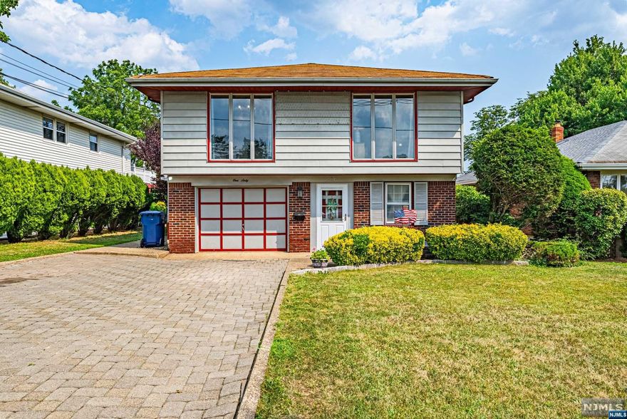 Welcome to Enjoyable and Easy Living in Hackensack!! A Contemporary Home with Walk in Access to the Ground Floor. Enter to a Large Foyer the makes way to a Single Car Garage with Laundry Area. Continue to a private Family Room with Sliding Doors to the Backyard and Pool, Summer Kitchen and a Full Bath. This is an Excellent Opportunity for Extended Living. The 2nd Floor has a Living room, Dining Room and an Eat in Kitchen. Continuing down the hall....A Primary Suite with A Full Bathroom, Bedroom, separate Full Bath and additional Bedroom with a Balcony looking over the Backyard/Pool. Peace and Relaxation awaits you in the Backyard with an Oversized In Ground Pool, Outdoor Shower and a Large Patio for Great Entertaining. All of this and Close to Transportation, Houses of Worship, Shopping and much more!!