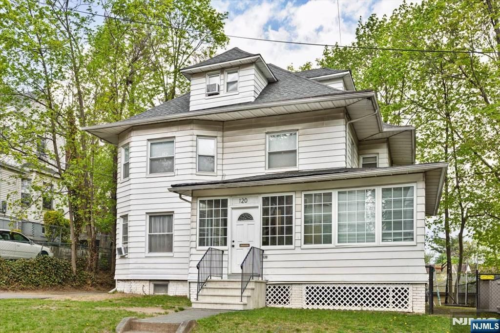 Photo of 116 Westervelt Place, Passaic, NJ 07055 (MLS # 26013843)