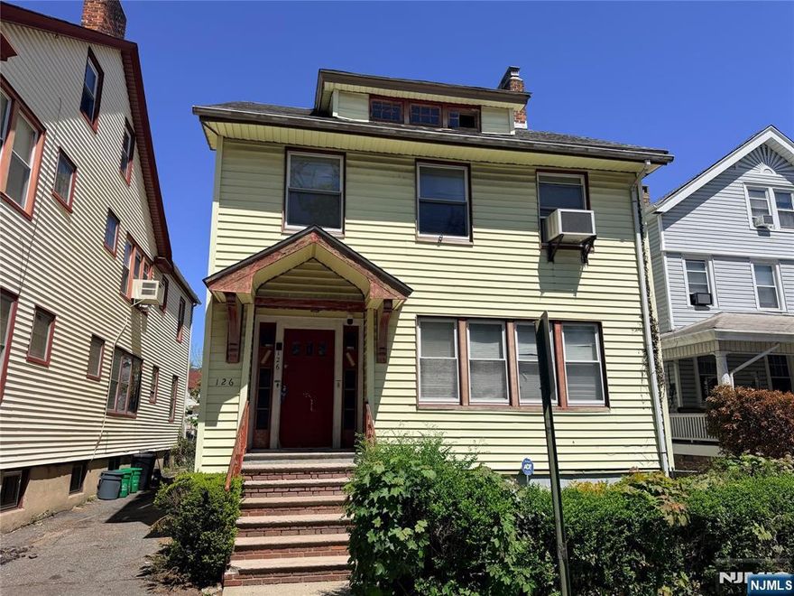 Exceptional 2-family investment opportunity in East Orange with strong income and value-add potential. The first-floor unit features 2 bedrooms, 1 full bath, and beautiful hardwood flooring throughout, with the flexibility to easily convert into a 3-bedroom layout. The second unit spans the 2nd and 3rd floors, currently configured as a spacious 4 bedroom, 1 bath, 1 office with the potential to expand into a 5 bedroom unit ideal for maximizing rental income. Additional highlights include a full unfinished basement with an existing bathroom, offering further expansion possibilities. Separate utilities provide convenience for both owner-occupants and investors. The property also features a private backyard and an extended driveway for ample off-street parking. Conveniently located near transportation, shopping, and schools, this property is perfectly positioned for both commuters and tenants. Whether you're looking to live in one unit and rent the other or fully capitalize on its income potential, this is a rare opportunity with significant upside.
