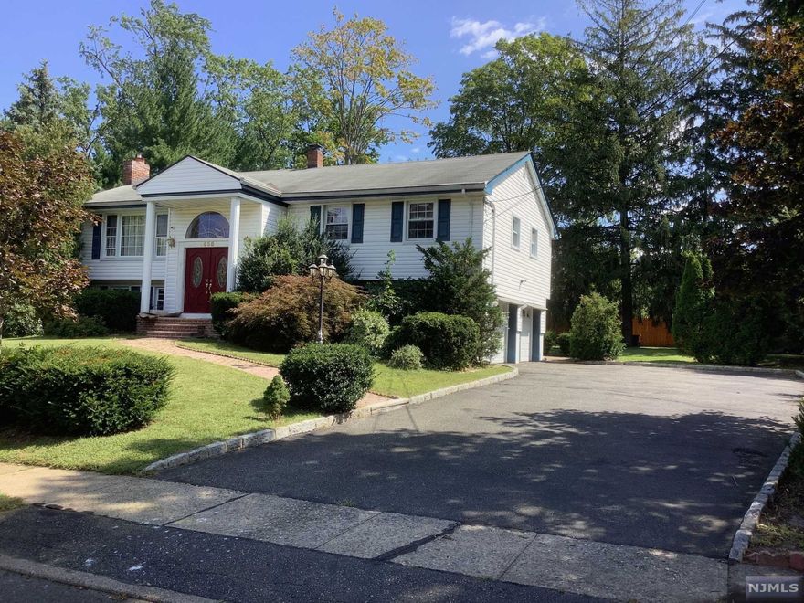 Beautiful home in the heart of Paramus with 4 large bedrooms and 2 1/2 baths. There is a wood burning fireplace and plenty of storage. Newer kitchen with SS appliances with open space to DIN and LIV. Hardwood floors all in. Central Air and great space for your potential pool or swings. Pride of ownership. All you have to do is unpack and start making memories in your new home. Come see this gem before it is gone! Virtual tour attached.