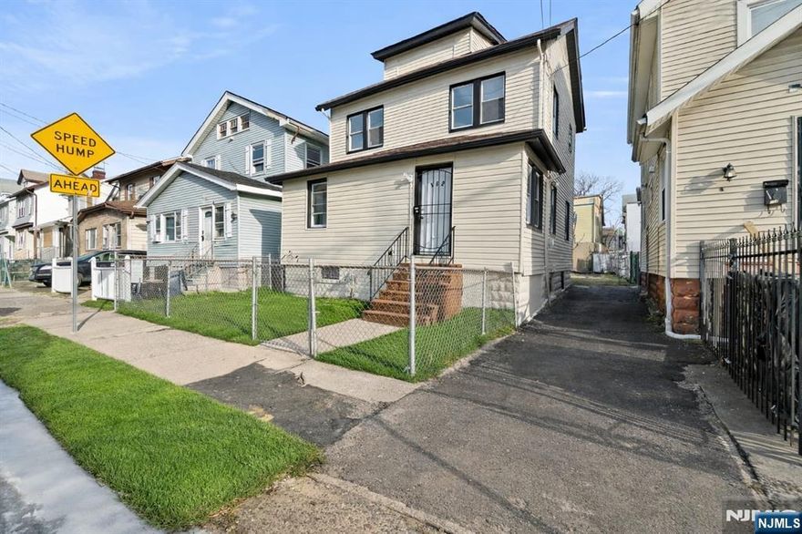 Rare opportunity! This stylish single-family home offers 4 spacious bedrooms and 2 beautifully updated bathrooms, designed for both comfort and everyday living. The exterior features easy-to-maintain siding, a fenced front yard for added privacy, and a private driveway no more stressing over parking. Inside, you'll find bright, sun-filled spaces with refinished hardwood floors, clean neutral tones, and an open, airy vibe throughout. The updated kitchen is a standout, featuring sleek white cabinets, a modern tiled backsplash, stainless steel appliances, and durable flooring perfect for cooking, hosting, or just enjoying your morning coffee. The flexible layout and generously sized bedrooms make it easy to create a home office, gym, or guest space to fit your lifestyle. Located close to public transportation, major highways, shopping, and everyday essentials, this home keeps you connected while still offering comfort and privacy. Move-in ready and full of style don't miss your chance to make it yours. Schedule your private showing today!