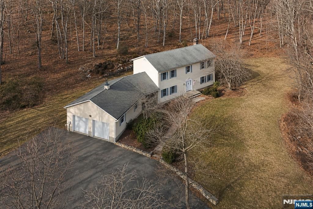 Photo of 611 Snake Den Road, West Milford, NJ 07480 (MLS # 26017764)