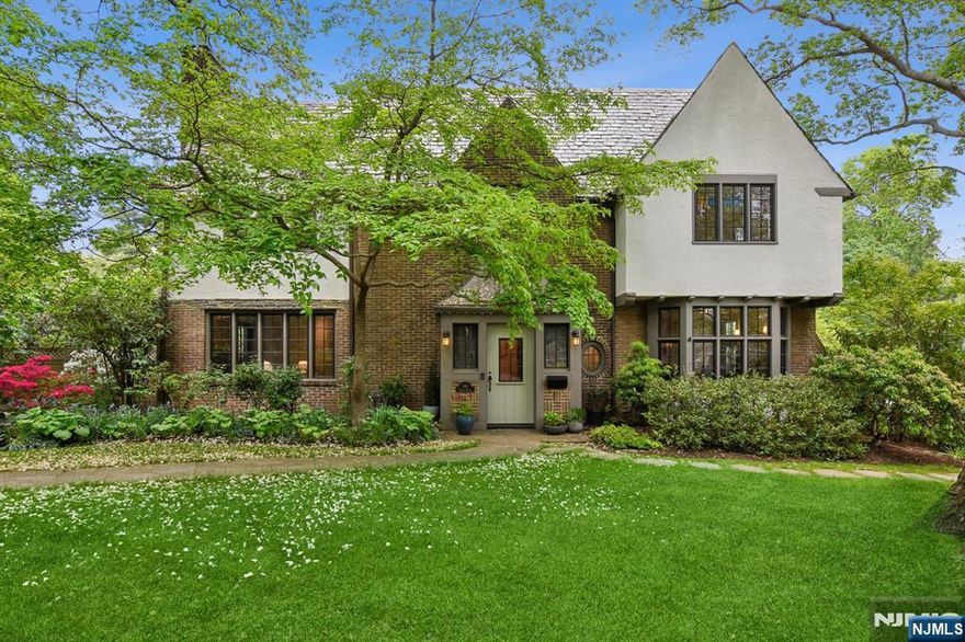 The perfect blend of in-town convenience and Hamptons-inspired serenity, this Upper Montclair stunner sits on over half an acre of lush, curated gardens that feel equal parts botanical retreat and farmstead charmâ€”with plenty of room left to add a pool if you like. The dreamy chefâ€™s kitchen with a central island opens wide to the great room and double sets of French doors that lead to an expansive patio overlooking your private garden oasis. But it doesnâ€™t stop there: tucked just beyond the greenery is your very own sport courtâ€”ideal for shooting hoops or a quick game of H-O-R-S-E. Upstairs, the vaulted primary suite is a true showstopper, while three of the additional four bedrooms each enjoy their own en-suite bath. Located on one of the most beloved blocks in townâ€”famous for its epic annual block partyâ€”youâ€™re just a couple short blocks to both Watchung Plaza and Upper Montclair Villageâ€™s shopping, cafés, restaurants, fitness studios, weekend auctions, and the NYC direct train.