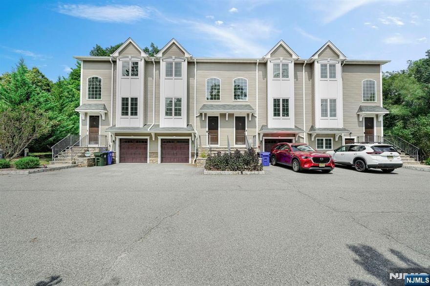 Welcome to 97 Mine Hill Rd. This beautiful 2-bedroom, 2.5-bathroom townhouse has everything you've been looking for. The open floor concept on the main floor is perfect for entertaining - offering granite countertops, stainless steel appliances, 9-foot ceilings, hardwood floors, and a spacious eat-in kitchen; open to your living room and a half bathroom. The second floor offers a spacious primary bedroom with a walk-in closet and a full bathroom. In addition to the second floor, you have your second bedroom with a full bathroom in the hallway. The ground floor offers a family room or office with access to your very own garage and a walkout to your private patio. The backyard features a beautiful backdrop to a lovely wooded view and stream, perfect for unwinding. This townhouse is a commuter's dream - centrally located to major highways Rt 80, Rt 46, and Rt 57 and the highly rated Mount Olive school district. Minutes away from your new home is Main Street providing quick access to shopping, groceries, restaurants, breweries, parks, and more.