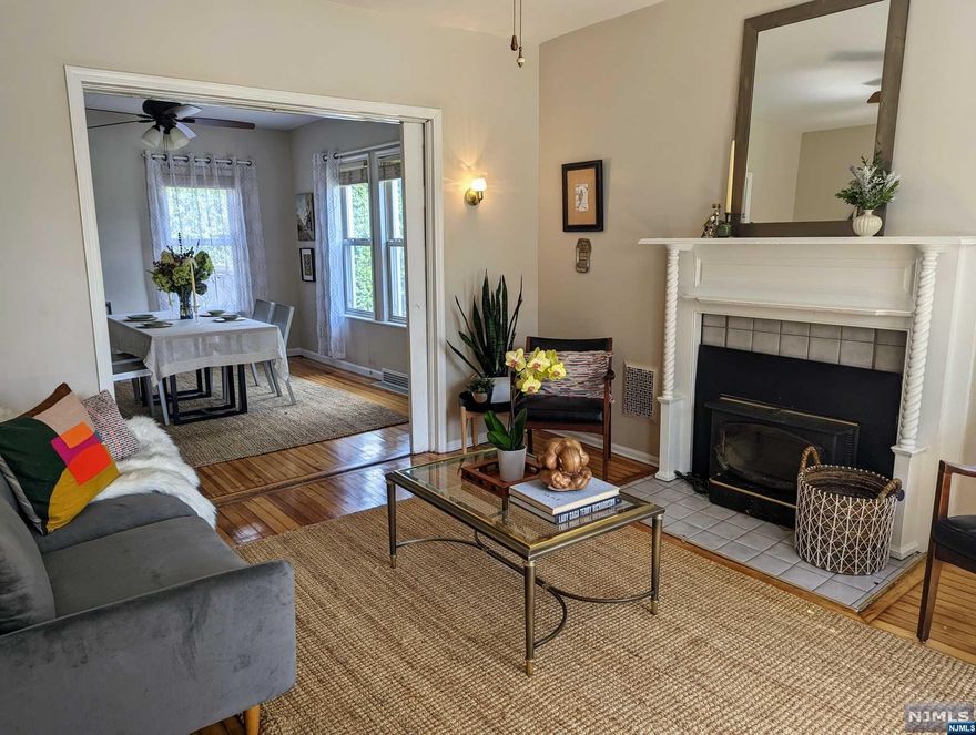 Experience the best of Montclair in this downtown stylish 4 bedroom, 2 bathroom Victorian. Built in 1898 this home retains some original features including original hardwood floors, vintage vent covers and pocket doors separating the living and dining rooms. While also showcasing more modern elements like the eat-in kitchen with center island and stainless steel appliances. Plus the back deck is great for entertaining in the wrap around yard. Additional features include central A/C on the 1st & 2nd floors, gas heat and a wood-burning fireplace. Additional toilet and sink in basement (can be converted to 3rd bathroom). Located on a quiet one-way street, a short walk to downtown restaurants and shops, nearby schools, parks and Eagle Rock Reservation. NYC bus 1 block away. This home is exactly where you want to be!