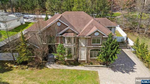Photo of 14 O Shaughnessy Lane, Closter, NJ 07624 (MLS # 26027190)