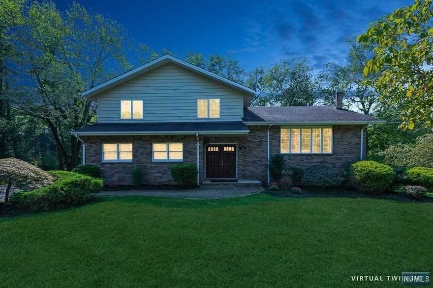 *** Multiple offers Highest&Best by 10/2 @ 2pm... Beautiful Sugar Maple Split Level Totally Renovated and Redone to Perfection Boasts Large Entry Foyer, Family Room With Stone Fireplace and French Doors to Two Tier Deck, Powder Room With Custom Tile. First Floor Boasts Formal Living Room With Picture Window, Formal Dining Room, Gourmet Kitchen With Custom Cherry Cabinetry, Stainless Steel Appliances, Granite Countertop and SGD to Two Tier Deck. Second Floor Boasts Master Bedroom, Master Bath, Two Large Bedrooms and Custom Tiled Bath. Basement is full, unfinished With outside entrance to backyard. Two Car Attached Oversized Garage, Paver Driveway and Walkway. Professionally Landscaped. This Home has Beautiful Custom Molding; Crown, Box, Trim, Throughout With No Expense Spared. Gorgeous Hardwood Floors and custom painting completes this fantastic home. Just move right in. Welcome Home! Owner is a lic. realtor.