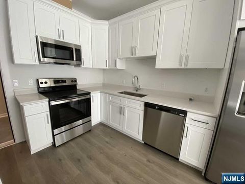 Photo of 74 Clarendon Pl #203, Hackensack, NJ 07601 (MLS # 26011179)