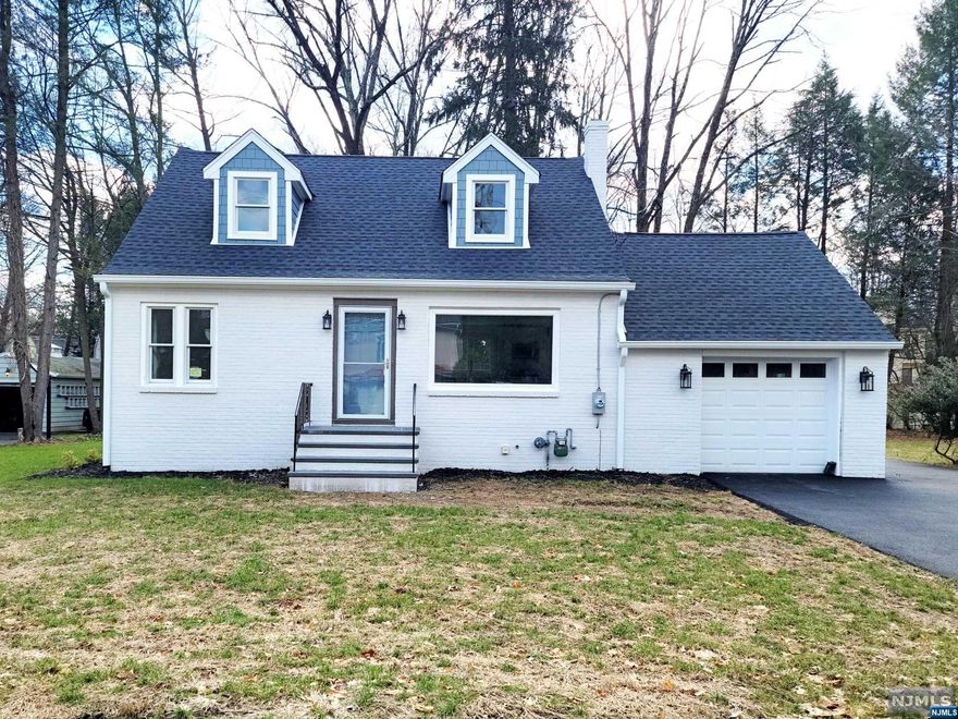 Hallmark Harriot: Situated on more than 1/2 an acre of land, in the idyllic town of Harrington Park, this 3 Bed 3 Full Bath home has been meticulously updated from the studs! New Renovations include: On first floor: Open Kitchen with waterfall island, new stainless steel appliances and hood, Large Pantry, Breakfast nook, Full bath, sliding door to backyard. Also on the first floor is attached 1 car garage, Bedroom, and office/den; Second floor renovations include: 2 Well appointed Bedrooms with ample closet space and New Full Bath. Basement has been updated with laundry room, open space, and additional 3rd full bathroom. Other work includes: New lighting, New windows, Dormers added, New Roof; Driveway with new asphalt, New Efficient Heating/Cooling System & duct work, Kitchen and Bathrooms on 1st and 2nd floor feature Radiant heat. Award winning school system. If you dream of owning an Absolutely Turn Key Home, this is the one