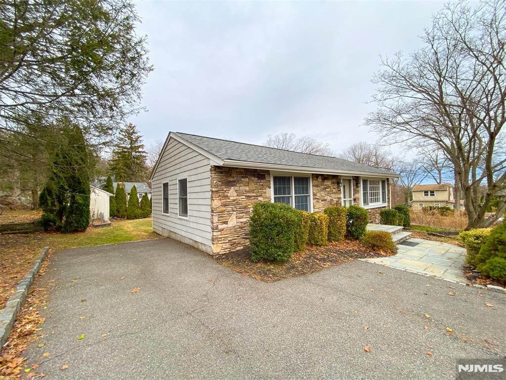 Photo of 28 Woodside Drive, West Milford, NJ 07480 (MLS # 26009076)
