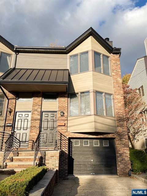 Photo of 411 Westview Pl, Fort Lee, NJ 07024 (MLS # 25043206)