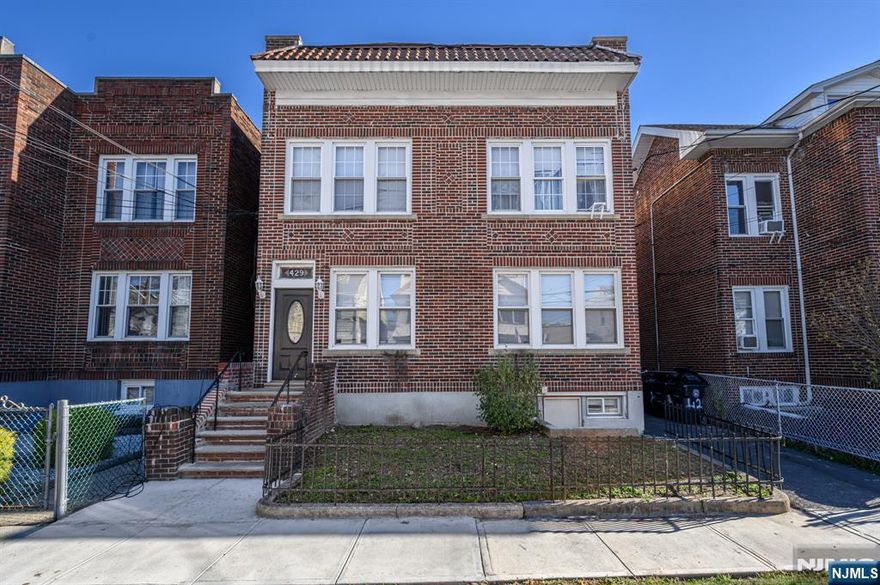 Excellent Investment Opportunity in this sprawling 4 Unit Multifamily Home with Bonus Finished Basement in thriving Newark! Well maintained, 5 Bedrooms, 6 Full Baths, and plenty of versatile bonus rooms to make your own. Perfectly appointed in a prime commuter location, just steps to the public transit bus line and light rail, major roads, shopping, parks, schools, and more! Units 1 and 2 make for accessible living on the first floor, each offering 1 bedroom, 1 full bath, kitchen and living area. On the second level, unit 3 also offers 1 bedroom, 1 fully renovated full bath, kitchen and living area. Unit 4 boasts 2 bedrooms, 1 fully renovated full bath, kitchen and living area. Units 3 & 4 also offer new electrical throughout. The finished basement features a full bath and bonus room. Adjacent living space holds another full bath, two bonus rooms and a storage room. Endless possibilities here! Semi-private entrances, separate gas & electric meters, large finished 1 Car Garage for extra storage, and a vinyl fenced backyard. Newer commercial rubber roof with 50 yr durability. A prime rental property to add to your portfolio, this opportunity is not to be missed! Come and see TODAY!