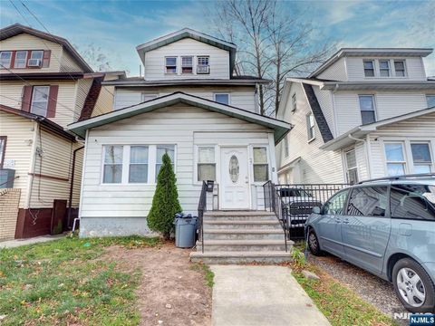 Photo of 77 Delmar Place, Irvington, NJ 07111 (MLS # 25041259)