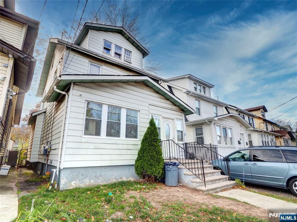 Photo of 77 Delmar Place, Irvington, NJ 07111 (MLS # 25041259)