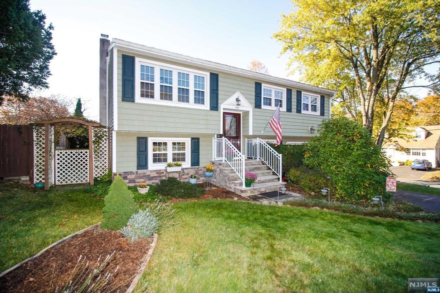 Welcome to your dream home! This stunning bi-level residence is nestled in the picturesque Landing section of Roxbury, offering an idyllic retreat surrounded by mature landscaping. Step into your private oasis, featuring a serene koi pond, a soothing hot tub, and a charming fire pit perfect for cozy evenings. Enjoy outdoor gatherings on the spacious patio and dining area, all set within a fenced backyard ideal for pets and play. Inside, you'll find a beautifully updated interior showcasing a custom kitchen, modern bathrooms, and refinished wood floors complemented by stylish bamboo flooring. The inviting family room boasts built-in units, making it a perfect space for relaxation and entertainment. This home also offers optional membership at Shore Hills Country Club and Beach, providing access to recreational amenities right at your doorstep. With convenient access to highways, train, and bus services to NYC, you'll enjoy the perfect blend of tranquility and accessibility.