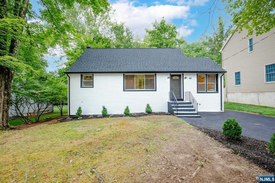 For more information on this home please contact Benny Abramov- 201-747-0564 Luxury Living at Its Finest. Step into this four-bedroom masterpiece with white oak floors and modern finishes throughout. The open-concept living and dining areas are perfect for entertaining, while a private room offers an ideal home office or retreat. The state-of-the-art kitchen features custom cabinetry, stainless steel appliances, a tile backsplash, and quartz countertops, ideal for culinary creativity. The main level boasts a stylish full bath and two well-appointed bedrooms. Upstairs, the primary suite includes an en-suite bath, alongside another spacious bedroom. The fully finished basement, with tile floors, offers an entertainment room, a laundry room, and ample storage. A new septic system will be installed before closing, ensuring peace of mind. Experience modern living in this stunning home. Schedule your private showing today and make it yours!