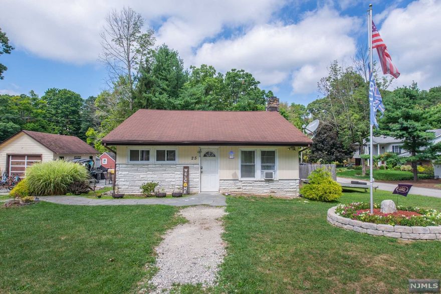 Come and See This Newly Listed Cozy Ranch Style Home Situated on an Sunny Corner Lot! This Home Has 3 Bedroom, 1 Full Bath a Spaciously Sized Living Room with Pergo Flooring, High Ceiling, Skylight and Floor to Ceiling Stone Fireplace! Galley Style Kitchen with Separate Dining Area! Excellent Single Level Living with Unfinished Basement with Storm Cellar Doors! Exterior has an Enclosed Gated Deck at Both Entry Points as well as a Fenced in Back Yard! 1 Car Garage with Side Door Entry! Close To Town Center, Highway Access, Schools, Shopping, Dining & More!