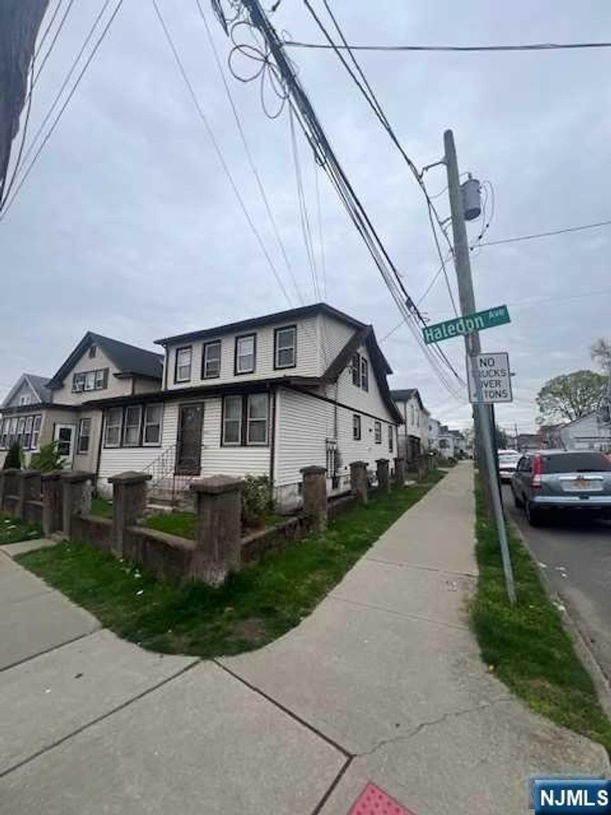 Ideal Investment Opportunity! This 2 family has Great Potential! Features a bonus Apt. above 2 Car garage with Living Rm, EIK, Bath & Bedroom. 1st Fl has EIK, Bathroom, Bedroom, Den (possible Bedroom), Living Rm & Enclosed porch converted to additional Bedroom. 2nd Fl has 2 Bedrooms, Bath, Living Rm & EIK. 3 Separate Furnaces and 2 electric boxes. Home is being sold As Is.