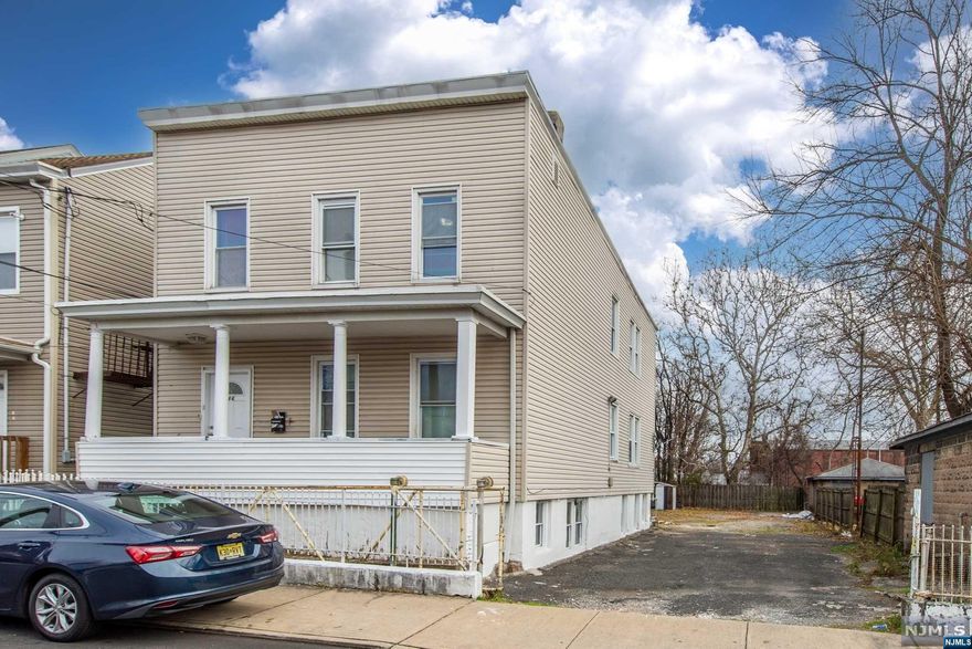 Welcome to 246 Van Blarcom St, a fantastic multiunit property with immense potential in Paterson that sits on an oversized lot of 50x121. This prime real estate offers two spacious units, providing an excellent investment opportunity for savvy buyer. First floor has 2 bedrooms and 1 bath. Second Floor has 2 bedrooms 1 bathroom. The basement has two extra rooms. Perfect rental purposes. Both units are currently vacant, allowing for immediate occupancy or the potential to set your own rental rates. Just a short commute to New York City, making it an ideal location for commuters.