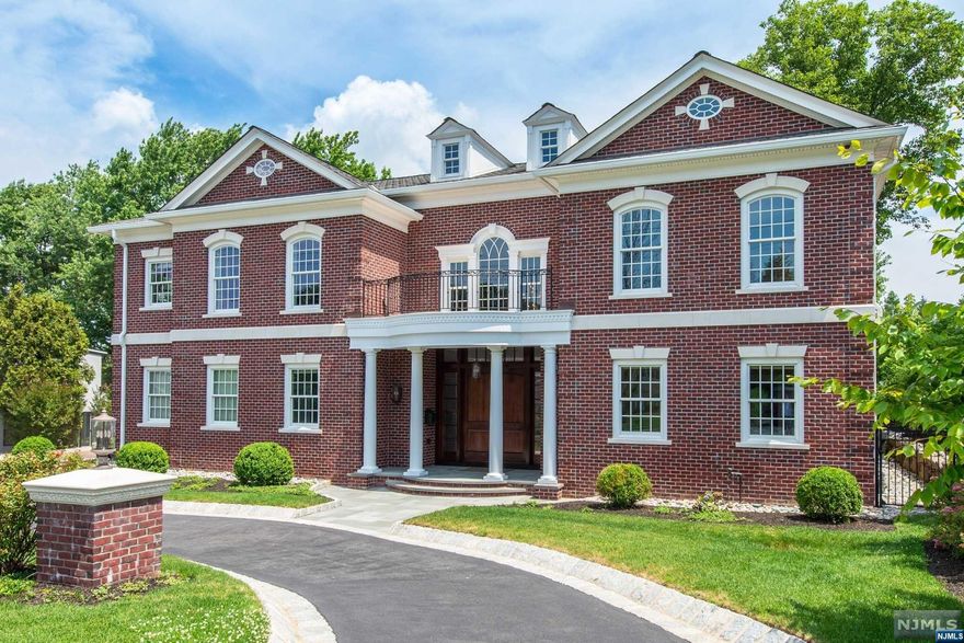 PRIDE OF OWNERSHIP, IMMACULATELY BUILT FOR OWNER'S OWN RESIDENCE. ALL BRICK GEORGIAN COLONIAL SET ON LOVELY PROPERTY W/CIRCULAR DRIVEWAY & PRIVATE YARD. A TWO-STORY FOYER SETS TONE OF THE APPROX 7200 SQ FT OF LUXURIOUS LIVING. 1ST LEVEL BOASTS 10'CEILINGS, CHEFS EIK, SCAVOLINI CABINETRY, 2 SUB-ZERO FRIDGES, WOLF APPLIANCE, MIELE DW, 2 SINKS, 2 DISPOSALS, BUTLERS PANTRY, A WELCOMING GREAT ROOM W/MARBLE FIREPLACE, BANQUET DR, CONVENIENT 1ST LEVEL PRIMARY SUITE, WALK-IN CLOSET, 1ST FL LDRY RM & PR. 2ND LEVEL OFFERS AN ADD'L PRIMARY SUITE, 2 CUSTOM WALK-IN CLOSETS, 3 ADD'L BDRMS, EACH WITH ENSUITE, WALK-IN CLOSETS, TRAY CEILINGS, 2ND FL LAUNDRY RM. BED AND BATH IN BASEMENT, TEMP-CONTROL ROOM FOR WINE. SPECIAL DETAILS; WIDE-PLANK BRAZILIAN CHERRY FLOORS, WATER FILTERING SYS, EMERGENCY GENERATOR, RADIANT HEAT FLRS, 16-ZONE HEATING, 8-ZONE AC, CONSTANT FRESH AIR SYS, 4 SUMP PUMPS, 6 CAMERA SECURITY SYSTEM. ENJOY ENGLEWOOD CLIFF'S LOW RE TAXES WITH CLOSE PROXIMITY TO GW BRIDGE.