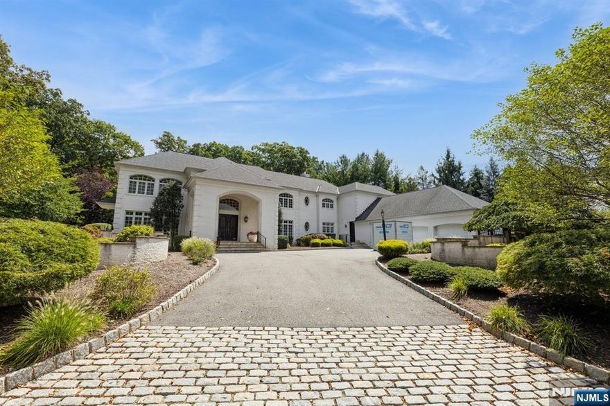 First time to market, this massive 7,576 sf (approx.) home with an additional 3,000+sf lower level has it all. 6 bedrooms, 4 en-suite with 2 extra bedrooms in the lower level. Total of 6 full and 3 1/2 baths, sauna, media room, rec room, 2 laundry rooms, 3 car garage, storage, basketball court, and built in pool with grotto and waterfall, this home is ideal for entertaining. Property was renovated in 2023/ 2025 and backs up to a reserve that adds to the extra private lot. Home has been featured in commercials and movies, and it's certainly a showstopper.