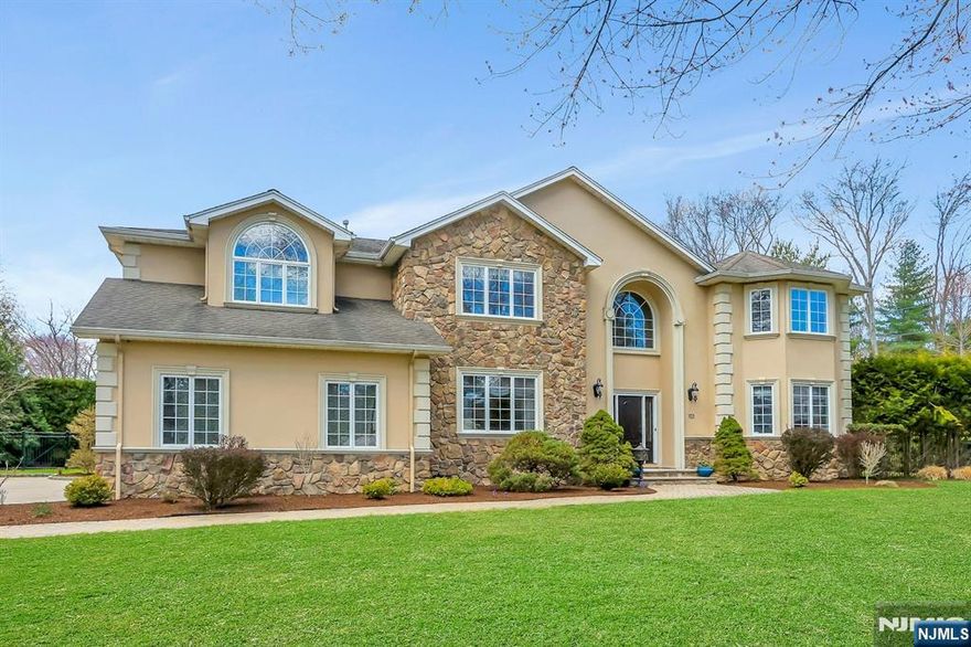Exquisite 5-BR Center Hall Colonial with an Oasis Backyard in River Vale!Â Â This magnificent home offers an expansive floor plan, perfect for both everyday living and elegant entertaining. A beautiful two-story entry welcomes you, leading into the formal living room and dining room with a charming butlerâ€™s pantry.Â  The impressive great room features soaring ceilings, fireplace, and Juliet balcony overlooking the great roomÂ creating a grand yet inviting atmosphere. The gourmet eat-in kitchen is designed for both function and style, offering wood cabinetry, granite countertops, a center island, built-in desk,Â spacious dining area, and access to the backyard. A spacious bedroom with an updated full bath, a custom pantry, and an additional powder room complete the first level. Upstairs, the luxurious primary suite is a true retreat, featuring its own fireplace, three custom closets, and a spa-like bath with a jetted tub, double vanity, and separate shower. Three additional generously sized bedrooms, a large office/bonus room, two full baths, and convenient laundry room complete the second level.Â Expansive walk-out lower level offers high ceilings and endless potential for additional living space. Set on lush, professionally landscaped property, the backyard featuresÂ a heated gunite saltwater pool, jacuzzi, and a large paver patio, creating the perfect setting for outdoor entertaining and relaxation.Â Â Ideally located close to shopping, top-rated schools, parks, and town
