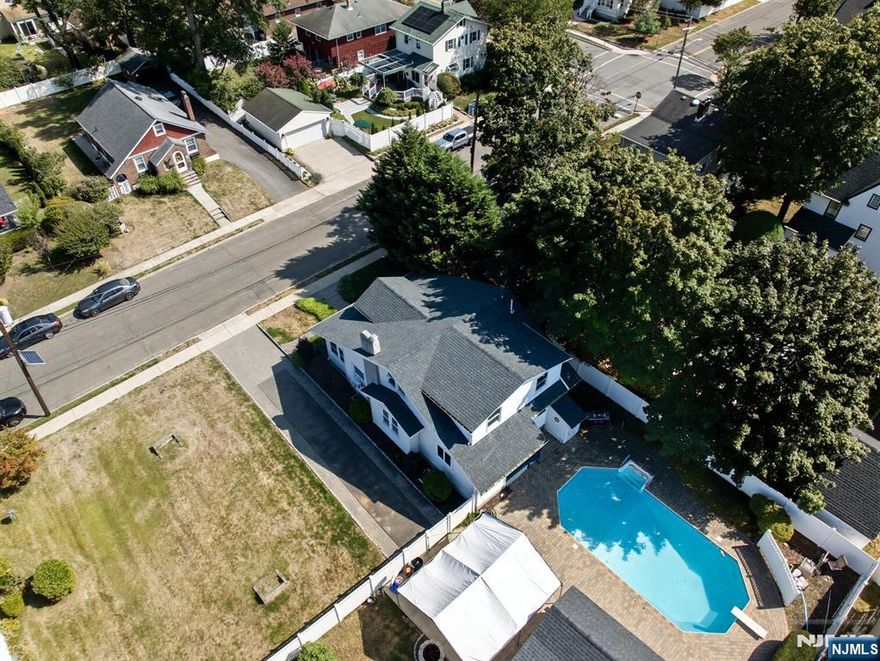 Well maintained home is situated on an oversized lot, offering plenty of room for future expansion. This home is bright and airy, with an abundance of natural light throughout. The first floor features a lovely living area, with an adjoining sitting room, spacious dining room, and an eat-in-kitchen with a large pantry for all of your storage & culinary needs & off of the hall is a full bath. All bedrooms are on the 2nd floor with a full spa like bath. The basement is finished with office space, bonus rooms, a 3rd full bath & storage. Outside the property offers a 2 car detached garage & a beautiful in-ground pool and oversized yard. This home checks the boxes. Close proximity to farmer's market right down the street on the corner, nearby Restaurants, Shopping, Transportation and more. The area offers the best of Everything!