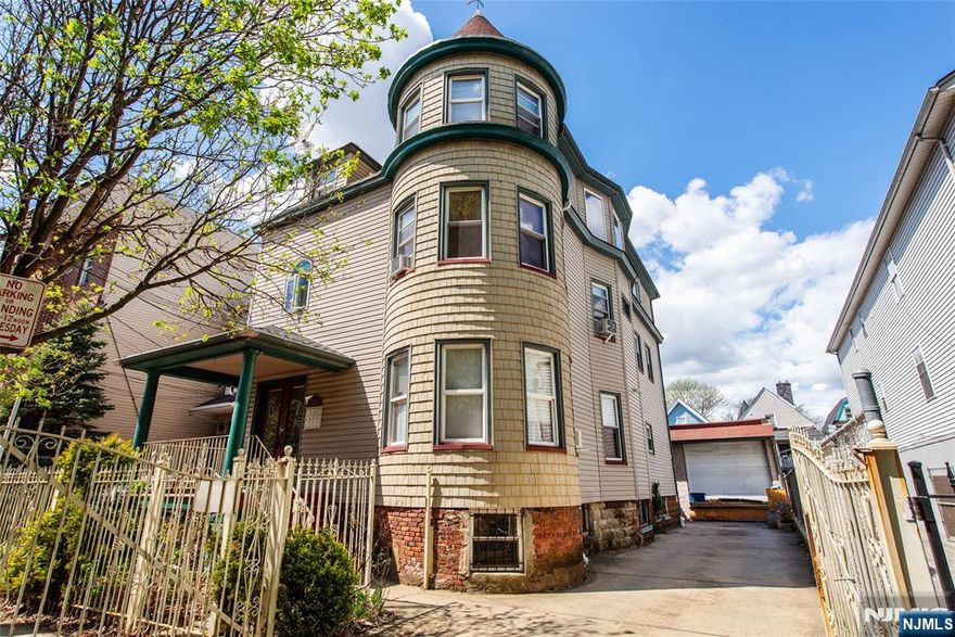 This spacious 3-family property in Newark offers a rare opportunity for both comfortable living and smart investing. Featuring a total of 9 bedrooms and 3 bathrooms, each unit provides generous layouts ideal for owner-occupants seeking space while generating rental income. The property includes a hard-to-find industrial-style 2-car garage perfect for personal use, storage, or additional income along with a 2-car driveway, giving you and your tenants the convenience of off-street parking. Located just minutes from the train station and light rail, commuting to NYC and surrounding areas is quick and easy, making it highly attractive for tenants. Whether you're looking to offset your monthly expenses or build long-term wealth, this property offers strong income potential and a favorable cap rate. Newark's continued growth and rental demand make this an excellent opportunity to own while investing in your future. Don't miss your chance to secure a multi-family home that works for you! Property is being sold "AS IS."