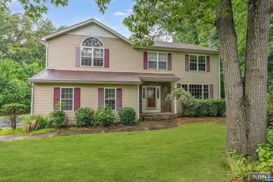 This beautiful, spacious, colonial has 1.65 acres and is located on a quiet cul-da-sac. Come see this gem of a house. The first floor offers a tall entry foyer including powder room, formal living room and dining room, large eat in kitchen, great room with gas fireplace and sliders to the large deck and view of the back yard. The second floor offers a very large master suite with vaulted ceilings, 3 large corner bedrooms, laundry room, main bath and pull down stairs to the attic. This home also has central air, hard wood floors, 2 car garage and large basement rec room.