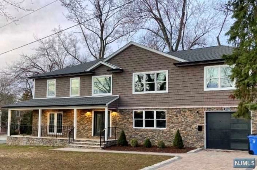 Under Construction. Welcome to this 2022 newly constructed home. This estate is 4,449 sq ft nestled in the prestigious suburbs of paramus close access minutes away from malls parks highways and NYC. Spacious 2 story foyer leads to family room with fireplace. Formal room with french doors that opens to a front porch. Dining room is appointed with custom built-ins and impressive millwork. The chefs dream eat-in kitchen features samsung appliances custom cabinets a huge island for extra cooking or seating space quartz counter tops including an oversize walk-in pantry room. The luxurious master suite offers an incredible spa-like bathroom stand up tub and two oversized custom walk-in closets. Finished basement has a spacious area that can be used for recreational or a home gym. All this, excellent paramus schools and Low Taxes.