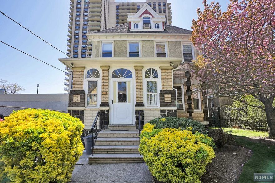 Old world charm! Rare opportunity to get a unique brick colonial house near Blvd East. Eight bedrooms and 3 full bath and a half bath. Newer roof, high ceiling and amazing details on doors, stairs etc. Upgraded kitchen with granite countertops, breakfast room, formal dining room with beautiful sunroom. Two enclosed porches, main bedroom with walk-out rooftop terrace. Full finished basement with recreation room, two car garage and a long driveway. House is on a double lot (50X109). Ideal for extended family. Can convert to 2 family house. Close to transportation. 15 minute drive to Manhattan. Trader Joes, Whole Foods and Mitstuwa supermarkets are nearby. Price to sell!