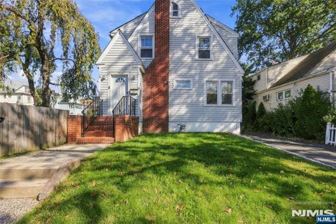 Photo of 82 Brook Avenue, Passaic, NJ 07055 (MLS # 26040036)