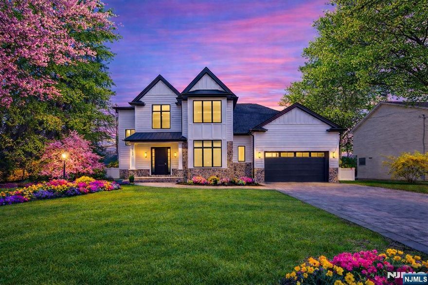 Brand new luxury construction at 163 Delmar, showcasing exceptional craftsmanship and modern design. This expansive 6-bedroom, 4.5-bath home was created by an award-winning architect and builder, blending high-end finishes with thoughtful functionality. The first floor offers soaring 10-foot ceilings, a custom chef's kitchen with Wolf and Sub-Zero appliances, large center island, and walk-in pantry, opening to a dramatic dual-height great room ideal for entertaining. A separate library/formal living room and elegant dining room provide flexible living and hosting options, while a main-level bedroom suite with full bath is perfect for guests or multigenerational living. Upstairs, the primary suite features dual walk-in closets and a spa-like bath with double vanity, soaking tub, glass-enclosed shower, and private water closet. Three additional well-proportioned bedrooms and additional baths complete the second floor. The finished lower level includes a home theater, gym, stunning bar, and generous storage. Additional amenities include a multi-zone sprinkler system, central vacuum, and oversized two-car garage. Located near highly regarded local schools, parks, shopping, and transportation, this new construction home delivers luxury, comfort, and convenience in a prime location.