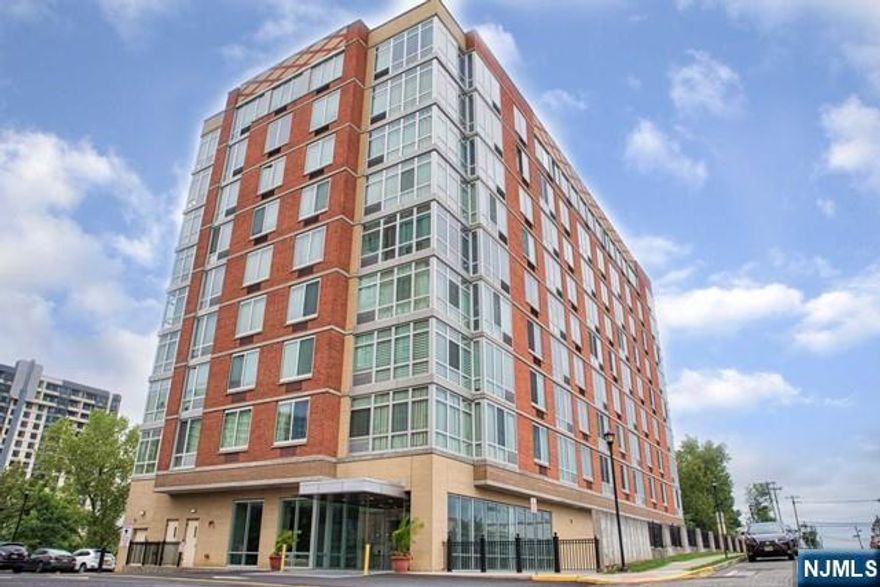 LUXURIOUS TWO BEDROOM CONDO WITH CONVENIENCE OF A CONCIERGE, GYM, YOGA STUDIO, GOLF SIMULATION, LOUNGE, CHILDREN'S PLAYROOM, GAME ROOM, AND BUSINESS CENTER., OPEN LAYOUT, HARDWOOD FLOOR THROUGHOUT. HIGH CEILING W/ OPEN KITCHEN W GRANITE COUNTERTOPS & SS APPLIANCES, BIG SIZE MASTER BR W/ WALK-IN CLOSET, GLASS DOOR SHOWER, LOTS OF CLOSET SPACES, WASHER AND DRYER IN THE UNIT, ALL MAJOR HIGHWAYS AND EASY COMMUNUTE TO NYC& EXPRESS BUS,SHOPPING CENTERS... *****RENT INCLUDED HEAT, COOKING GAS, WATER, HOT WATER, 2 PARKING SPACES,THIS IS THE TRIO OF PERFECT LIVING!!!